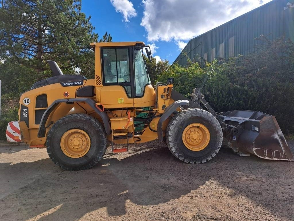 Volvo L60H - Utovarivač na kotačima: slika Volvo L60H - Utovarivač na kotačima Volvo L60H - Utovarivač na kotačima: slika Volvo L60H - Utovarivač na kotačima