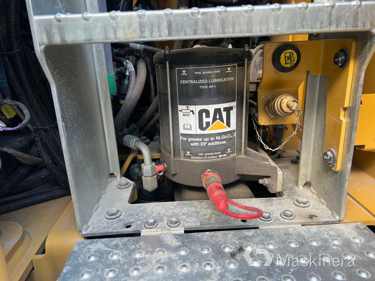 Bager gusjeničar CAT M317  Hjulgrävare CAT M317: slika Bager gusjeničar CAT M317  Hjulgrävare CAT M317