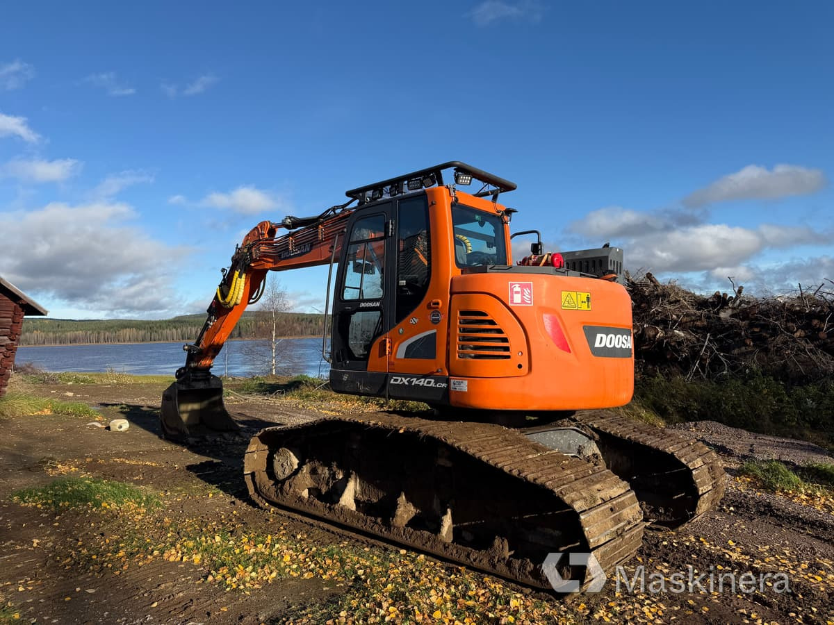 Grävmaskin Doosan DX140LCR-5 / Skördaraggregat 25RH - Bager gusjeničar: slika Grävmaskin Doosan DX140LCR-5 / Skördaraggregat 25RH - Bager gusjeničar Grävmaskin Doosan DX140LCR-5 / Skördaraggregat 25RH - Bager gusjeničar: slika Grävmaskin Doosan DX140LCR-5 / Skördaraggregat 25RH - Bager gusjeničar