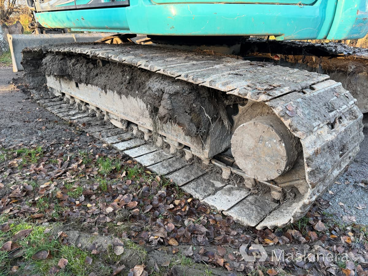 Bager gusjeničar Grävmaskin Kobelco SK140SRLC-5: slika Bager gusjeničar Grävmaskin Kobelco SK140SRLC-5 Bager gusjeničar Grävmaskin Kobelco SK140SRLC-5: slika Bager gusjeničar Grävmaskin Kobelco SK140SRLC-5