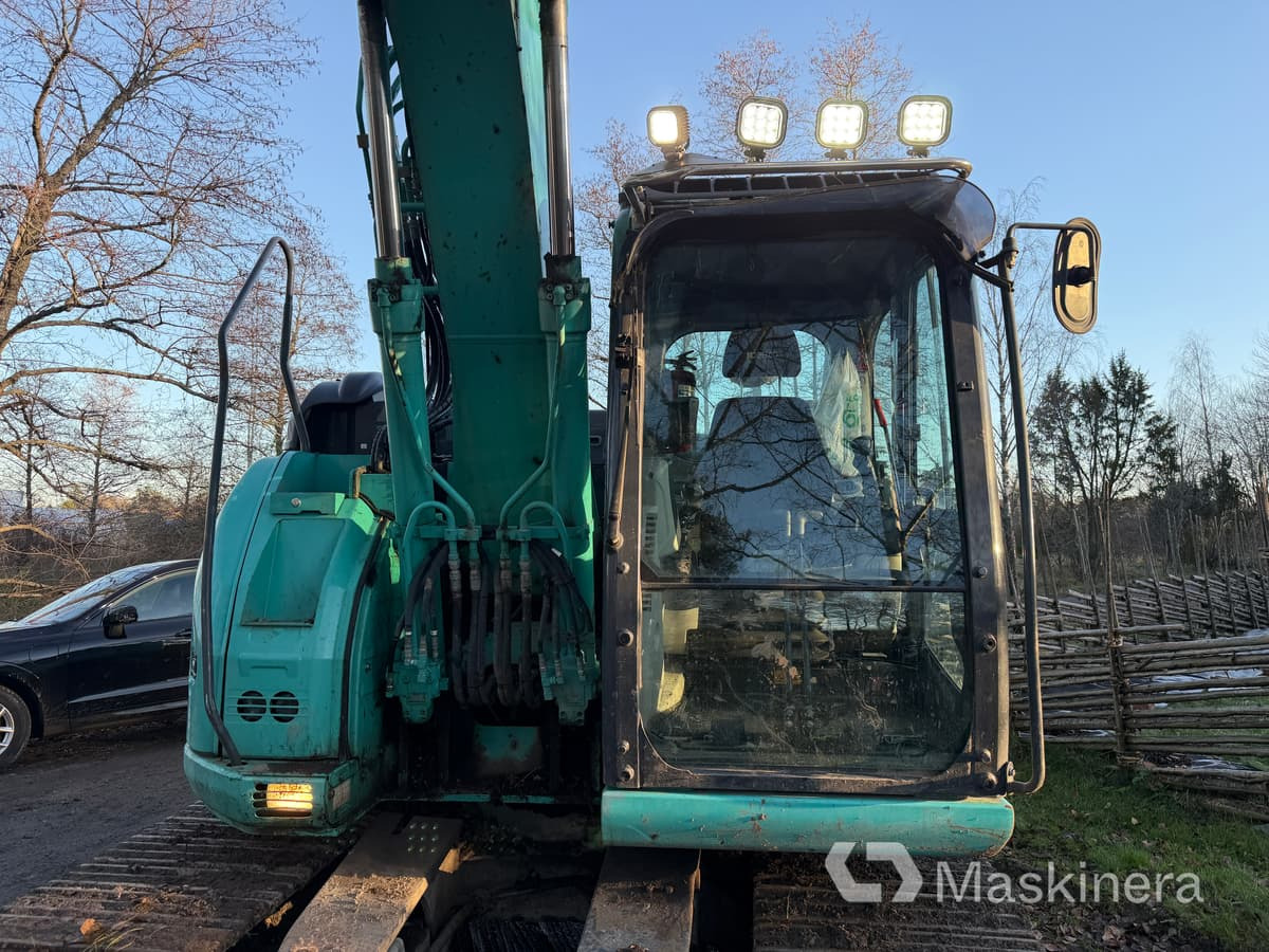 Bager gusjeničar Grävmaskin Kobelco SK140SRLC-5: slika Bager gusjeničar Grävmaskin Kobelco SK140SRLC-5 Bager gusjeničar Grävmaskin Kobelco SK140SRLC-5: slika Bager gusjeničar Grävmaskin Kobelco SK140SRLC-5