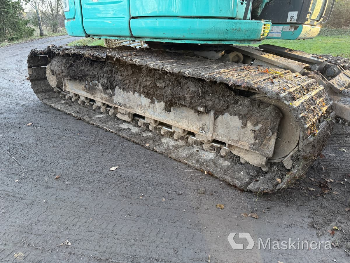 Bager gusjeničar Grävmaskin Kobelco SK140SRLC-5: slika Bager gusjeničar Grävmaskin Kobelco SK140SRLC-5 Bager gusjeničar Grävmaskin Kobelco SK140SRLC-5: slika Bager gusjeničar Grävmaskin Kobelco SK140SRLC-5