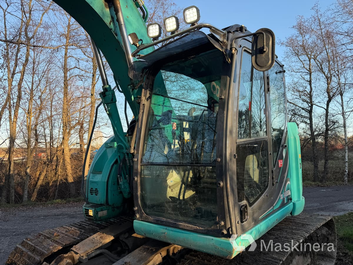 Bager gusjeničar Grävmaskin Kobelco SK140SRLC-5: slika Bager gusjeničar Grävmaskin Kobelco SK140SRLC-5 Bager gusjeničar Grävmaskin Kobelco SK140SRLC-5: slika Bager gusjeničar Grävmaskin Kobelco SK140SRLC-5