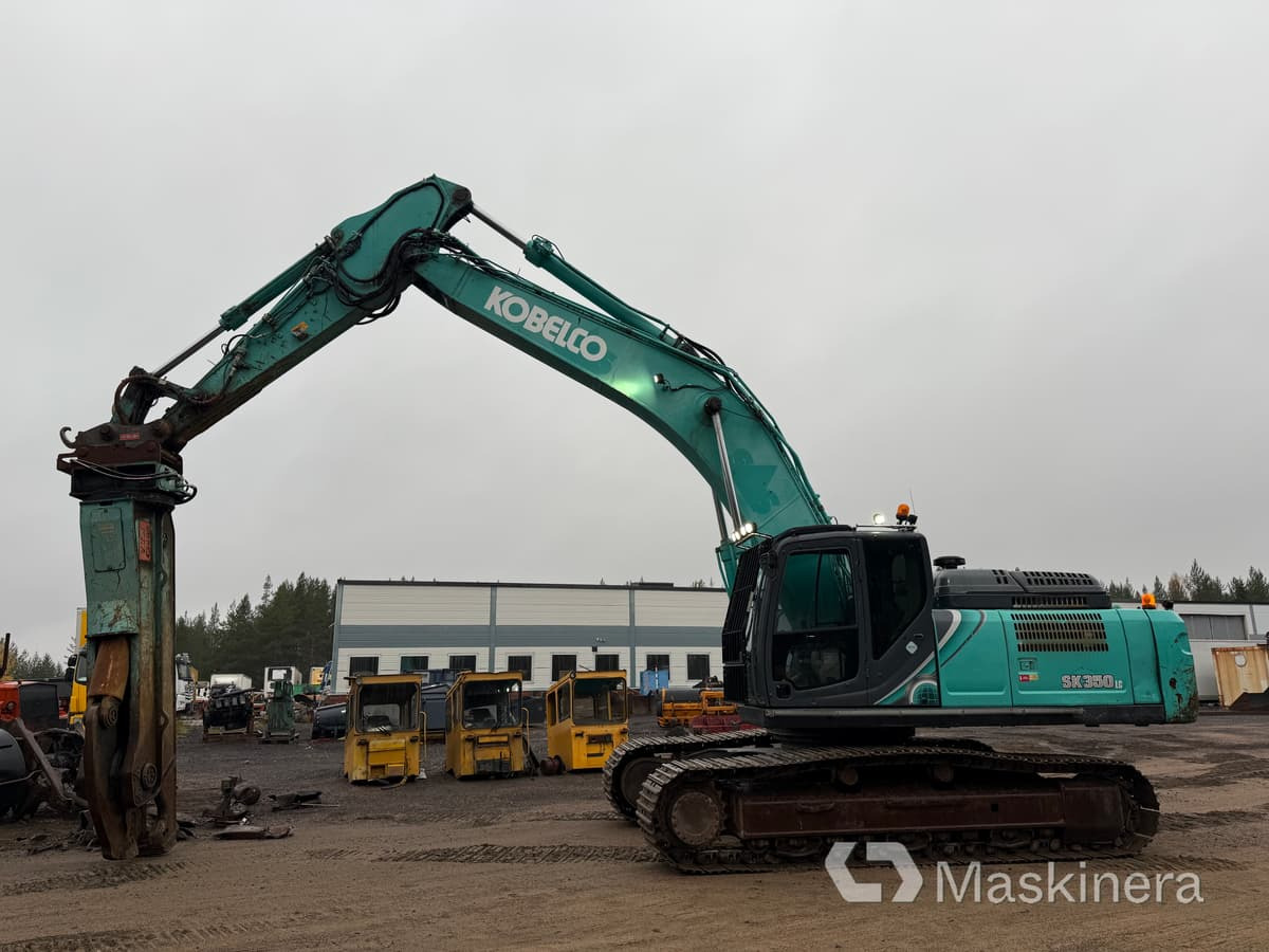 Grävmaskin Kobelco SK350LC-10 med stålsax - Bager gusjeničar: slika Grävmaskin Kobelco SK350LC-10 med stålsax - Bager gusjeničar Grävmaskin Kobelco SK350LC-10 med stålsax - Bager gusjeničar: slika Grävmaskin Kobelco SK350LC-10 med stålsax - Bager gusjeničar