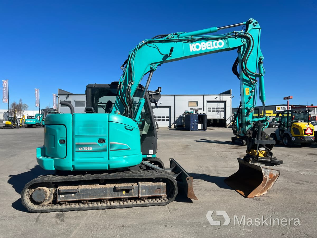 Grävmaskin Kobelco SK75SR-3E - Bager gusjeničar: slika Grävmaskin Kobelco SK75SR-3E - Bager gusjeničar Grävmaskin Kobelco SK75SR-3E - Bager gusjeničar: slika Grävmaskin Kobelco SK75SR-3E - Bager gusjeničar