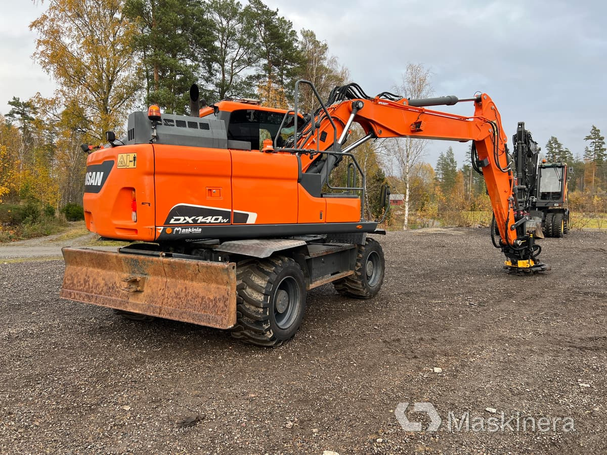 Hjulgrävare Doosan DX140-5 - Bager gusjeničar: slika Hjulgrävare Doosan DX140-5 - Bager gusjeničar Hjulgrävare Doosan DX140-5 - Bager gusjeničar: slika Hjulgrävare Doosan DX140-5 - Bager gusjeničar
