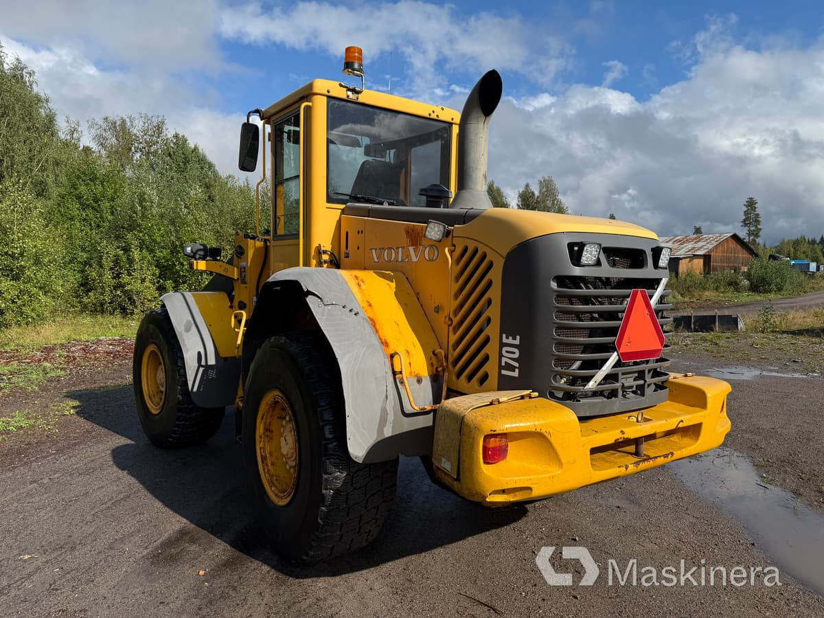 Hjullastare Volvo L70E - Utovarivač na kotačima: slika Hjullastare Volvo L70E - Utovarivač na kotačima Hjullastare Volvo L70E - Utovarivač na kotačima: slika Hjullastare Volvo L70E - Utovarivač na kotačima