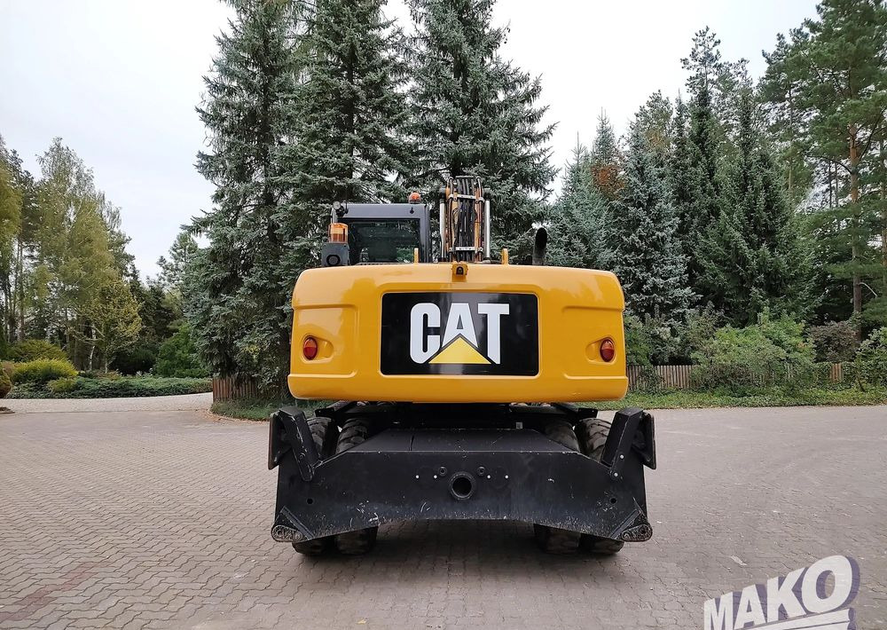 Caterpillar M313D - Bager na kotačima: slika Caterpillar M313D - Bager na kotačima Caterpillar M313D - Bager na kotačima: slika Caterpillar M313D - Bager na kotačima