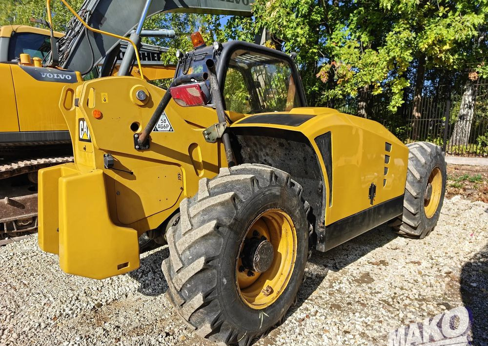 Caterpillar TH407 - Teleskopski rukovatelj: slika Caterpillar TH407 - Teleskopski rukovatelj Caterpillar TH407 - Teleskopski rukovatelj: slika Caterpillar TH407 - Teleskopski rukovatelj