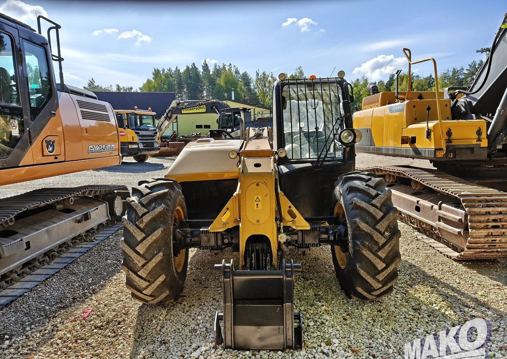 Teleskopski rukovatelj Caterpillar TH407: slika Teleskopski rukovatelj Caterpillar TH407 Teleskopski rukovatelj Caterpillar TH407: slika Teleskopski rukovatelj Caterpillar TH407