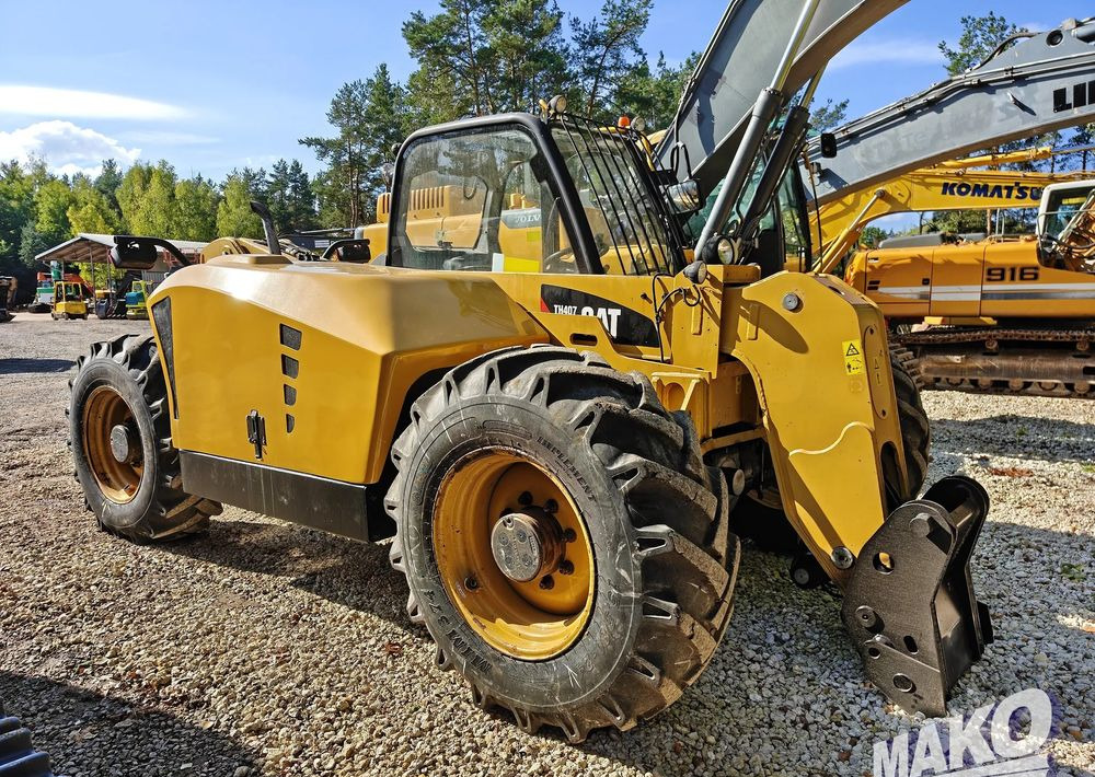 Teleskopski rukovatelj Caterpillar TH407: slika Teleskopski rukovatelj Caterpillar TH407 Teleskopski rukovatelj Caterpillar TH407: slika Teleskopski rukovatelj Caterpillar TH407