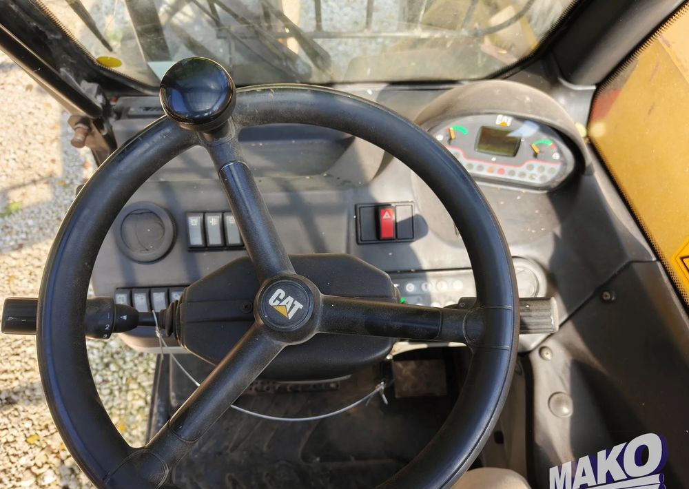 Teleskopski rukovatelj Caterpillar TH407: slika Teleskopski rukovatelj Caterpillar TH407 Teleskopski rukovatelj Caterpillar TH407: slika Teleskopski rukovatelj Caterpillar TH407