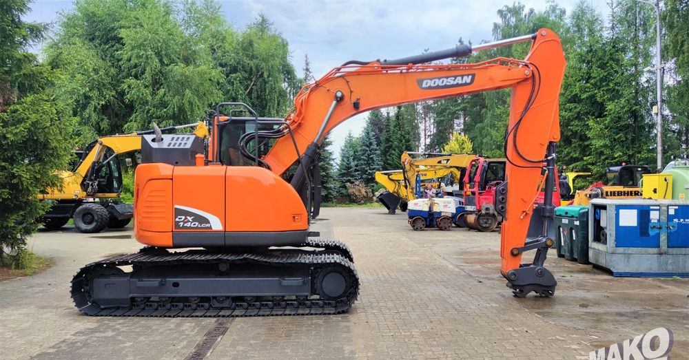 Doosan DX140LCR-5 - Bager gusjeničar: slika Doosan DX140LCR-5 - Bager gusjeničar Doosan DX140LCR-5 - Bager gusjeničar: slika Doosan DX140LCR-5 - Bager gusjeničar