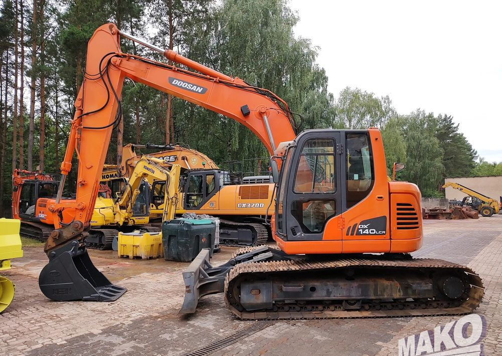 Doosan DX140LCR - Bager gusjeničar: slika Doosan DX140LCR - Bager gusjeničar Doosan DX140LCR - Bager gusjeničar: slika Doosan DX140LCR - Bager gusjeničar