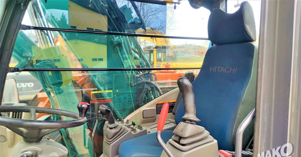 Bager na kotačima Hitachi ZX140W-3: slika Bager na kotačima Hitachi ZX140W-3