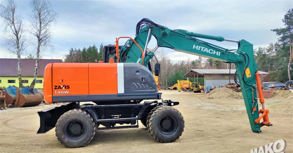 Hitachi ZX140W-3 - Bager na kotačima: slika Hitachi ZX140W-3 - Bager na kotačima Hitachi ZX140W-3 - Bager na kotačima: slika Hitachi ZX140W-3 - Bager na kotačima
