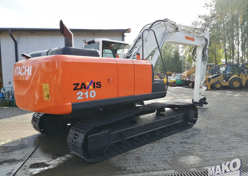 Hitachi ZX210 LC-5B - Bager gusjeničar: slika Hitachi ZX210 LC-5B - Bager gusjeničar Hitachi ZX210 LC-5B - Bager gusjeničar: slika Hitachi ZX210 LC-5B - Bager gusjeničar