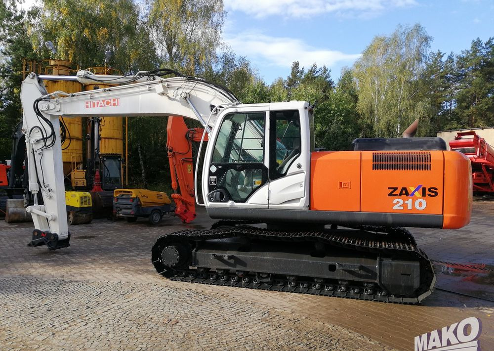Hitachi ZX210 LC-5B - Bager gusjeničar: slika Hitachi ZX210 LC-5B - Bager gusjeničar Hitachi ZX210 LC-5B - Bager gusjeničar: slika Hitachi ZX210 LC-5B - Bager gusjeničar