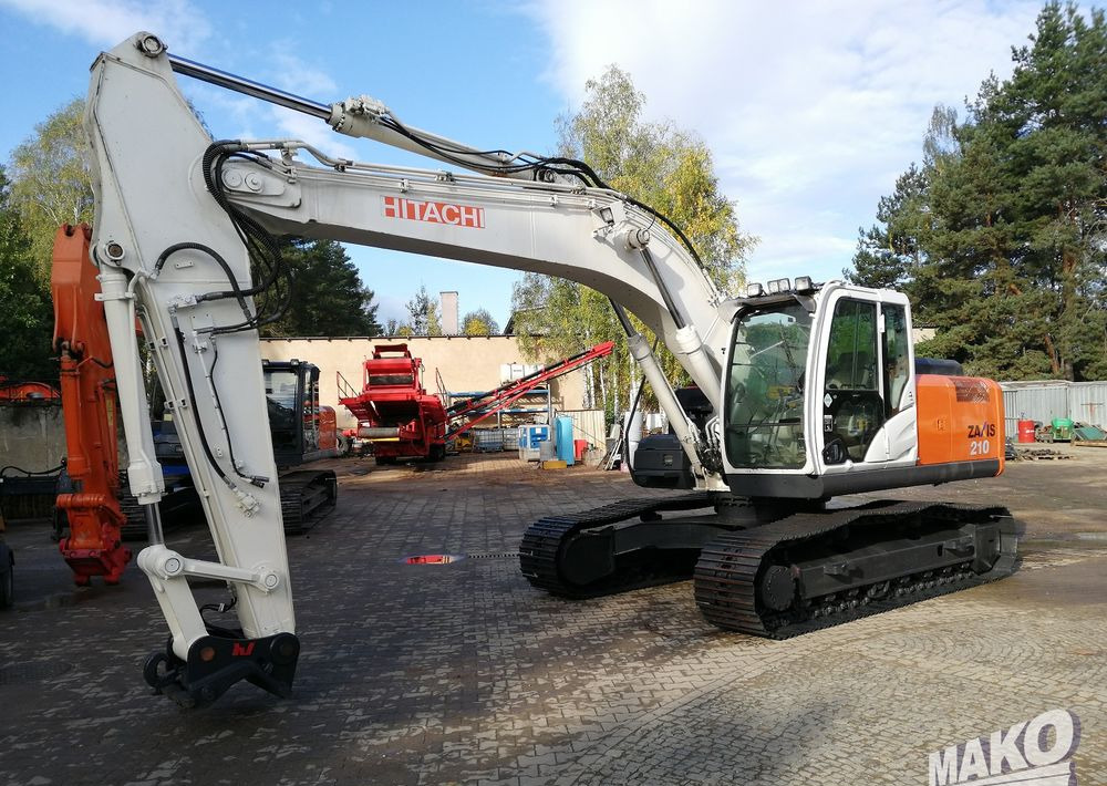 Hitachi ZX210 LC-5B - Bager gusjeničar: slika Hitachi ZX210 LC-5B - Bager gusjeničar Hitachi ZX210 LC-5B - Bager gusjeničar: slika Hitachi ZX210 LC-5B - Bager gusjeničar