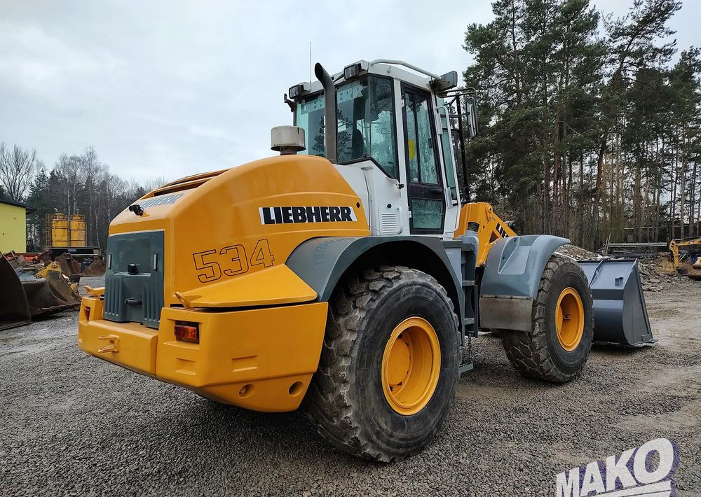 Liebherr L534 - Utovarivač na kotačima: slika Liebherr L534 - Utovarivač na kotačima Liebherr L534 - Utovarivač na kotačima: slika Liebherr L534 - Utovarivač na kotačima