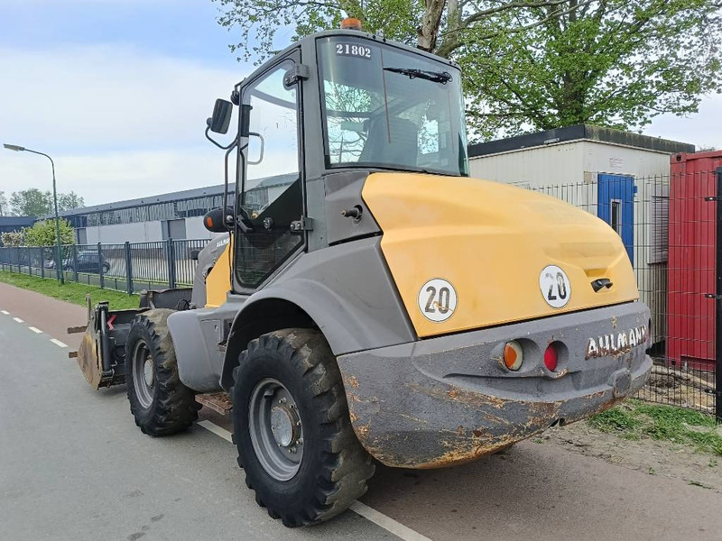 Ahlmann AS 700 wiellader shovel loader lader bak+vorken - Utovarivač na kotačima: slika Ahlmann AS 700 wiellader shovel loader lader bak+vorken - Utovarivač na kotačima Ahlmann AS 700 wiellader shovel loader lader bak+vorken - Utovarivač na kotačima: slika Ahlmann AS 700 wiellader shovel loader lader bak+vorken - Utovarivač na kotačima
