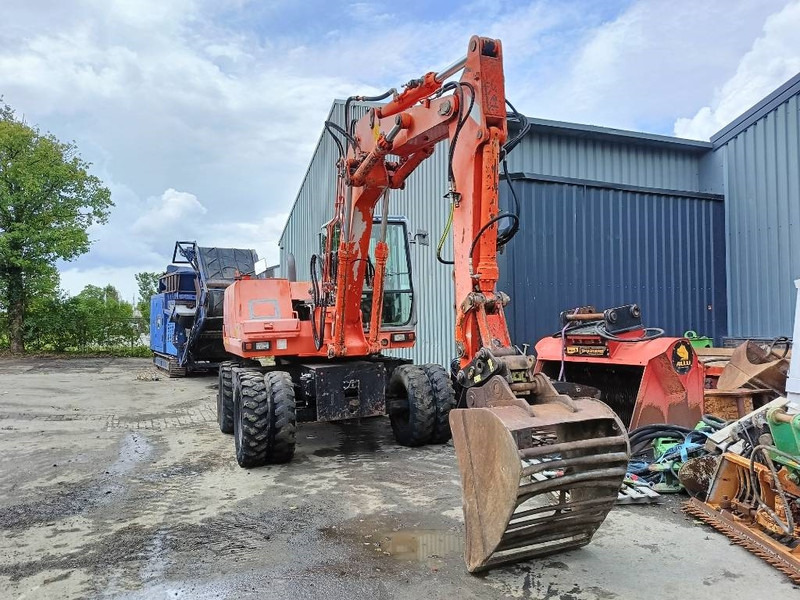 FIAT-HITACHI FH120W bandenkraan Wheel Excavator graafmachine - Bager na kotačima: slika FIAT-HITACHI FH120W bandenkraan Wheel Excavator graafmachine - Bager na kotačima FIAT-HITACHI FH120W bandenkraan Wheel Excavator graafmachine - Bager na kotačima: slika FIAT-HITACHI FH120W bandenkraan Wheel Excavator graafmachine - Bager na kotačima
