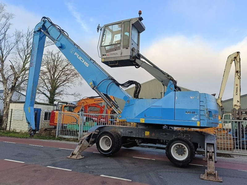 Fuchs MHL 350 industry waste handler umslagbagger - Stroj za rukovanje otpadom: slika Fuchs MHL 350 industry waste handler umslagbagger - Stroj za rukovanje otpadom Fuchs MHL 350 industry waste handler umslagbagger - Stroj za rukovanje otpadom: slika Fuchs MHL 350 industry waste handler umslagbagger - Stroj za rukovanje otpadom
