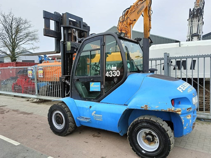 Manitou MI 70 H freelift ruw terrein 7 T heftruck forklift - Diesel viličar: slika Manitou MI 70 H freelift ruw terrein 7 T heftruck forklift - Diesel viličar Manitou MI 70 H freelift ruw terrein 7 T heftruck forklift - Diesel viličar: slika Manitou MI 70 H freelift ruw terrein 7 T heftruck forklift - Diesel viličar
