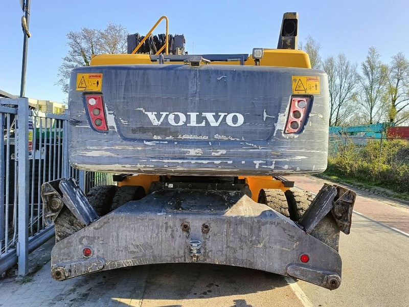 Volvo EW 210 D waste industry handler 25ton umslagbagger - Stroj za rukovanje otpadom: slika Volvo EW 210 D waste industry handler 25ton umslagbagger - Stroj za rukovanje otpadom Volvo EW 210 D waste industry handler 25ton umslagbagger - Stroj za rukovanje otpadom: slika Volvo EW 210 D waste industry handler 25ton umslagbagger - Stroj za rukovanje otpadom