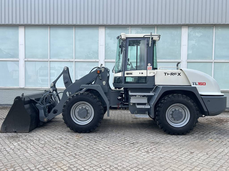 Terex TL 160 2016 - Utovarivač na kotačima: slika Terex TL 160 2016 - Utovarivač na kotačima Terex TL 160 2016 - Utovarivač na kotačima: slika Terex TL 160 2016 - Utovarivač na kotačima