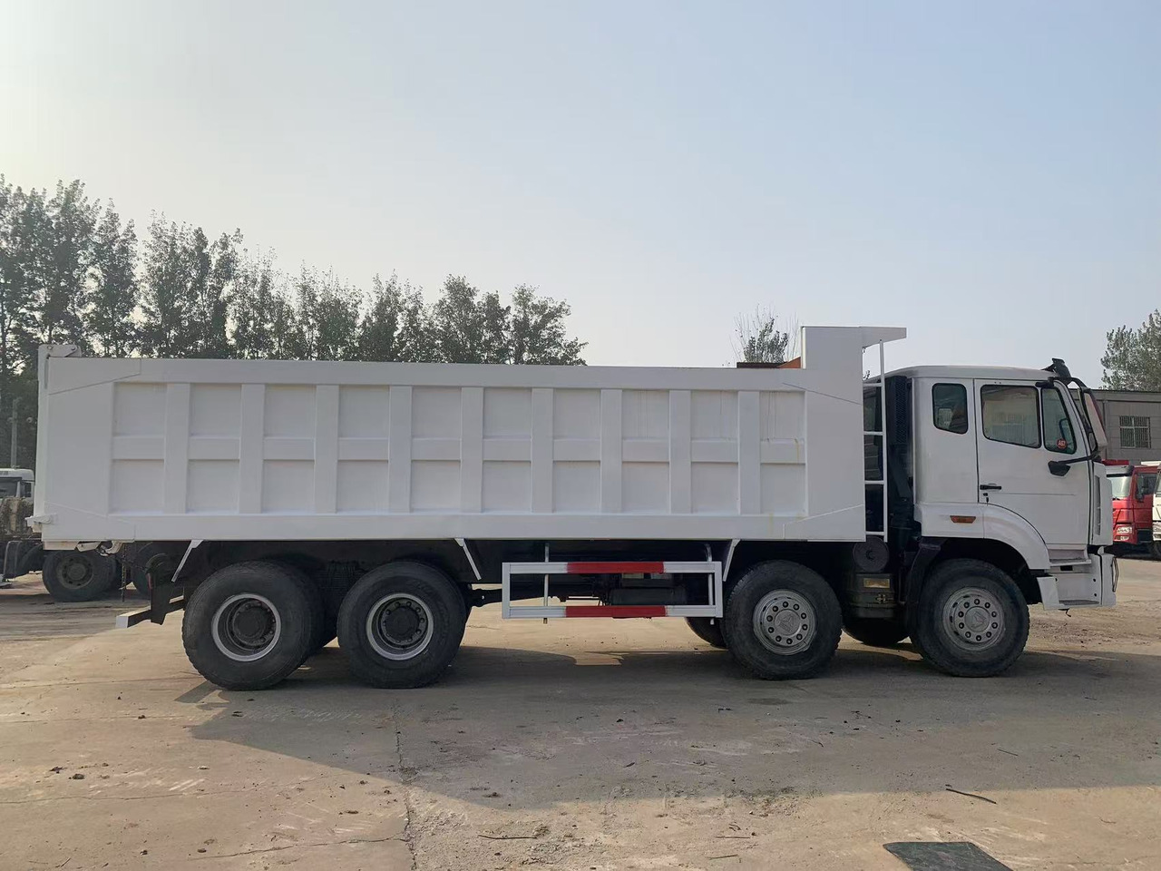 Howo 8x4 Tipper Truck Used Condition HOWO Dumper Truck Left Hand Drive - Kiper: slika Howo 8x4 Tipper Truck Used Condition HOWO Dumper Truck Left Hand Drive - Kiper Howo 8x4 Tipper Truck Used Condition HOWO Dumper Truck Left Hand Drive - Kiper: slika Howo 8x4 Tipper Truck Used Condition HOWO Dumper Truck Left Hand Drive - Kiper