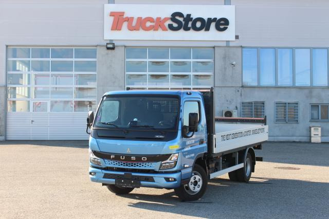 FUSO Canter 4C15E M - BATT. - Dostavno vozilo s ravnom platformom: slika FUSO Canter 4C15E M - BATT. - Dostavno vozilo s ravnom platformom FUSO Canter 4C15E M - BATT. - Dostavno vozilo s ravnom platformom: slika FUSO Canter 4C15E M - BATT. - Dostavno vozilo s ravnom platformom