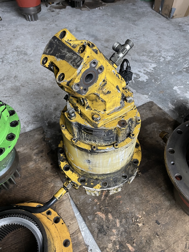 NEW HOLLAND Mh plus - Motor okretanja za Bager: slika NEW HOLLAND Mh plus - Motor okretanja za Bager NEW HOLLAND Mh plus - Motor okretanja za Bager: slika NEW HOLLAND Mh plus - Motor okretanja za Bager