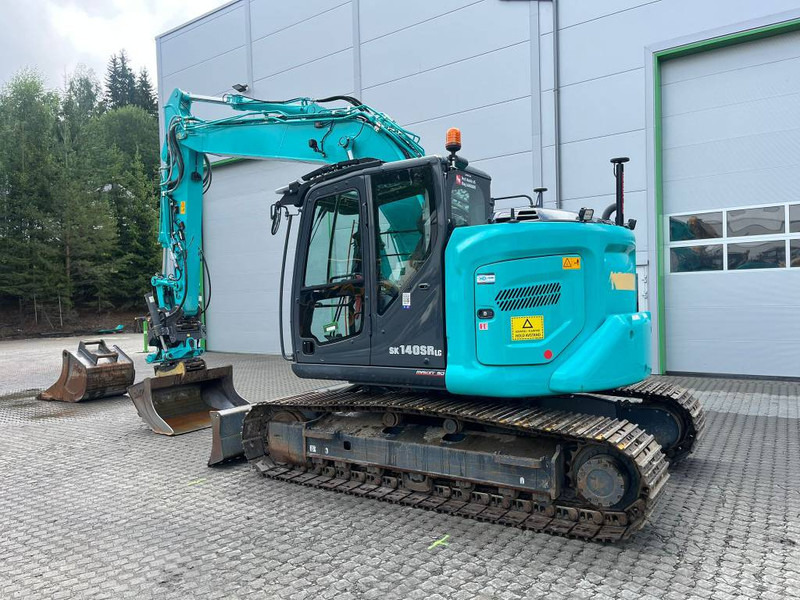 Kobelco SK 140 SR LC - 7 - Bager gusjeničar: slika Kobelco SK 140 SR LC - 7 - Bager gusjeničar Kobelco SK 140 SR LC - 7 - Bager gusjeničar: slika Kobelco SK 140 SR LC - 7 - Bager gusjeničar
