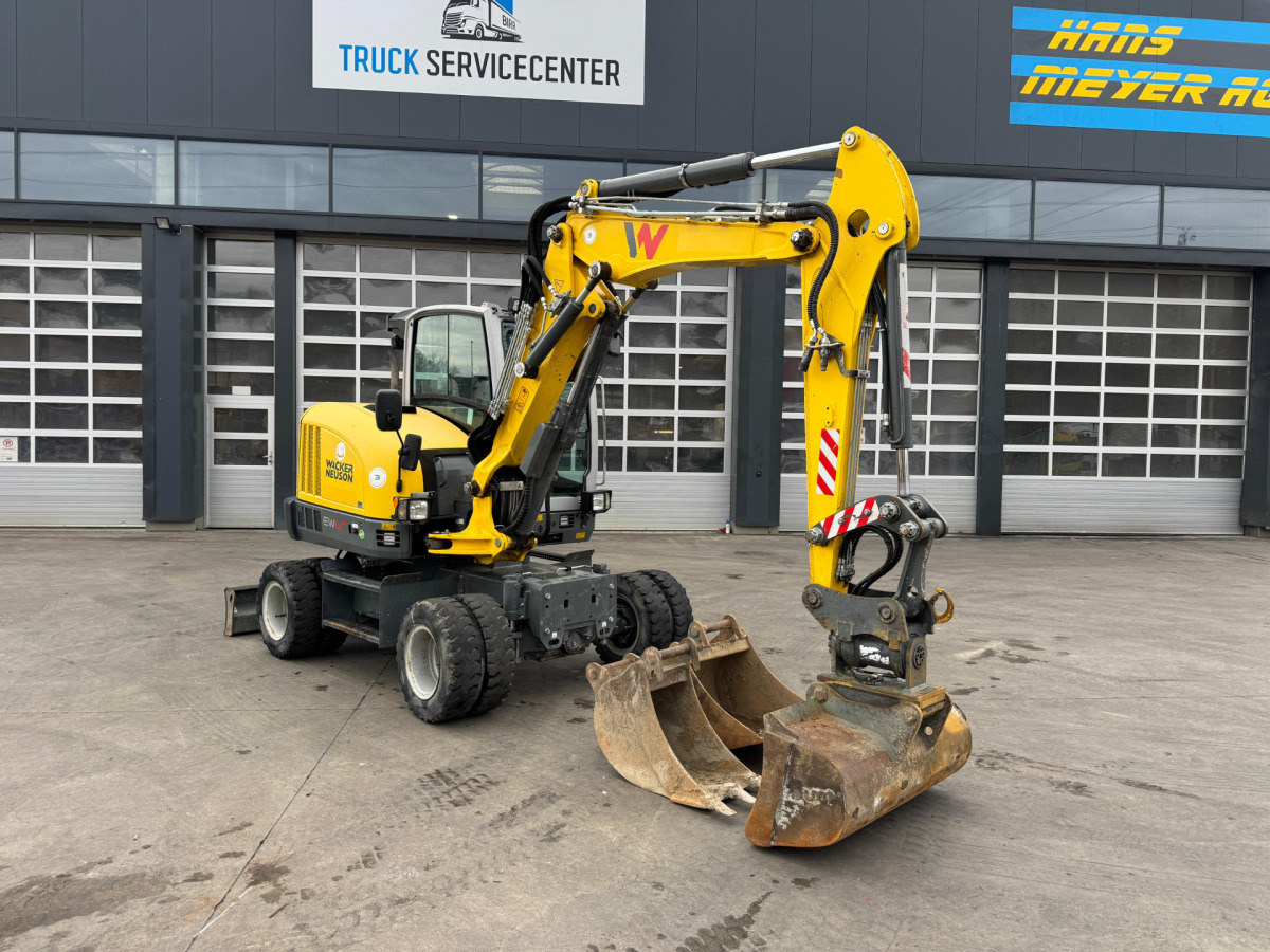 NEUSON EW65 E14-2 Powertilt 3x Schaufeln - Bager na kotačima: slika NEUSON EW65 E14-2 Powertilt 3x Schaufeln - Bager na kotačima NEUSON EW65 E14-2 Powertilt 3x Schaufeln - Bager na kotačima: slika NEUSON EW65 E14-2 Powertilt 3x Schaufeln - Bager na kotačima