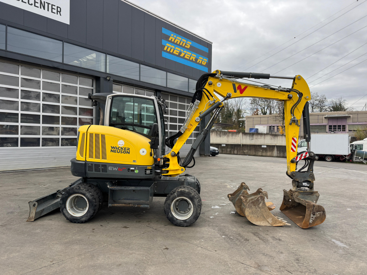 NEUSON EW65 E14-2 Powertilt 3x Schaufeln - Bager na kotačima: slika NEUSON EW65 E14-2 Powertilt 3x Schaufeln - Bager na kotačima NEUSON EW65 E14-2 Powertilt 3x Schaufeln - Bager na kotačima: slika NEUSON EW65 E14-2 Powertilt 3x Schaufeln - Bager na kotačima