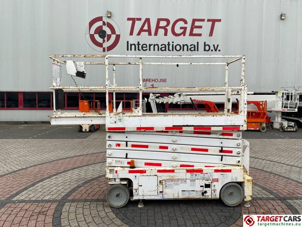 Genie GS-3232 Electric Scissor Work Lift 1175cm - Škarasta podizna platforma: slika Genie GS-3232 Electric Scissor Work Lift 1175cm - Škarasta podizna platforma Genie GS-3232 Electric Scissor Work Lift 1175cm - Škarasta podizna platforma: slika Genie GS-3232 Electric Scissor Work Lift 1175cm - Škarasta podizna platforma