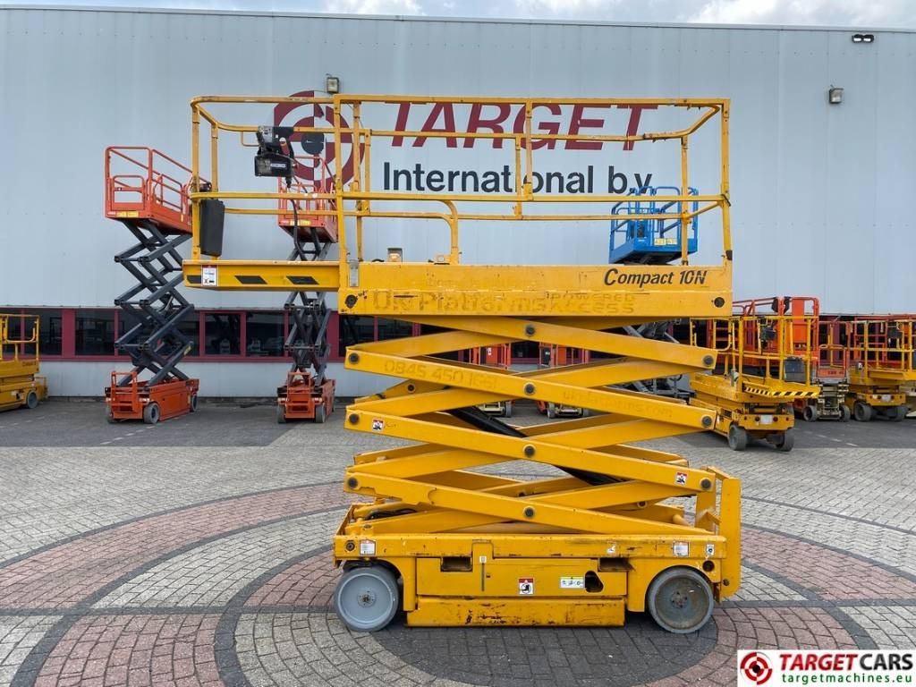 Haulotte Compact 10N Electric Scissor Work Lift 1000cm - Škarasta podizna platforma: slika Haulotte Compact 10N Electric Scissor Work Lift 1000cm - Škarasta podizna platforma Haulotte Compact 10N Electric Scissor Work Lift 1000cm - Škarasta podizna platforma: slika Haulotte Compact 10N Electric Scissor Work Lift 1000cm - Škarasta podizna platforma