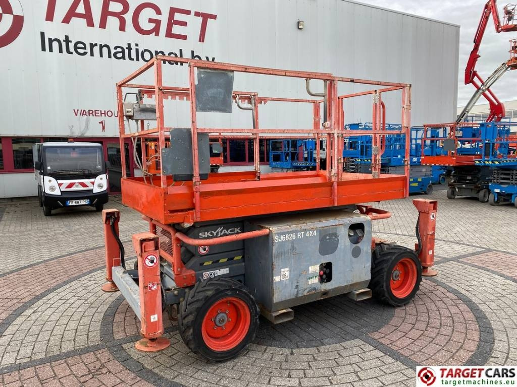 SkyJack SJ6826 RT Diesel 4x4 Scissor Work Lift 992cm - Škarasta podizna platforma: slika SkyJack SJ6826 RT Diesel 4x4 Scissor Work Lift 992cm - Škarasta podizna platforma SkyJack SJ6826 RT Diesel 4x4 Scissor Work Lift 992cm - Škarasta podizna platforma: slika SkyJack SJ6826 RT Diesel 4x4 Scissor Work Lift 992cm - Škarasta podizna platforma