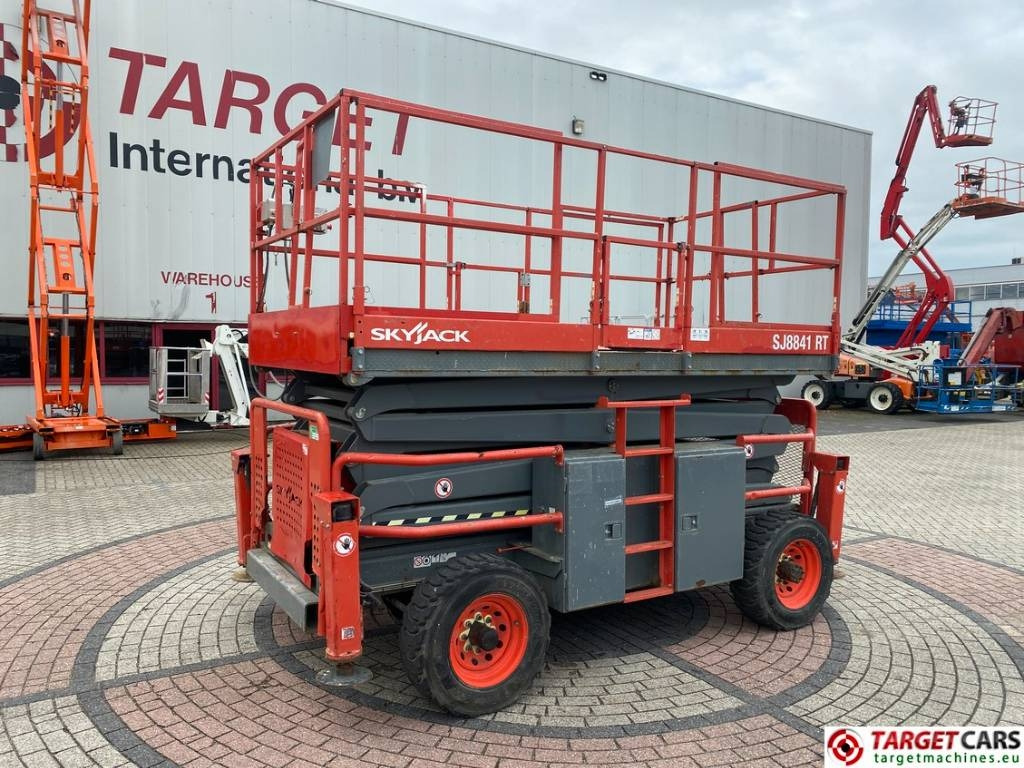 SkyJack SJ8841RT Diesel 4x4 Scissor Work Lift 1430cm - Škarasta podizna platforma: slika SkyJack SJ8841RT Diesel 4x4 Scissor Work Lift 1430cm - Škarasta podizna platforma SkyJack SJ8841RT Diesel 4x4 Scissor Work Lift 1430cm - Škarasta podizna platforma: slika SkyJack SJ8841RT Diesel 4x4 Scissor Work Lift 1430cm - Škarasta podizna platforma