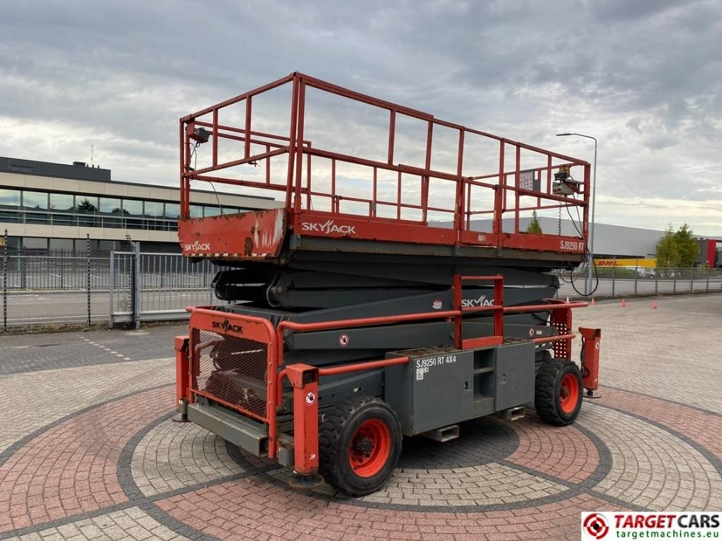 SkyJack SJ9250 RT Diesel 4x4 Scissor 9250 Work Lift 1720cm - Škarasta podizna platforma: slika SkyJack SJ9250 RT Diesel 4x4 Scissor 9250 Work Lift 1720cm - Škarasta podizna platforma SkyJack SJ9250 RT Diesel 4x4 Scissor 9250 Work Lift 1720cm - Škarasta podizna platforma: slika SkyJack SJ9250 RT Diesel 4x4 Scissor 9250 Work Lift 1720cm - Škarasta podizna platforma