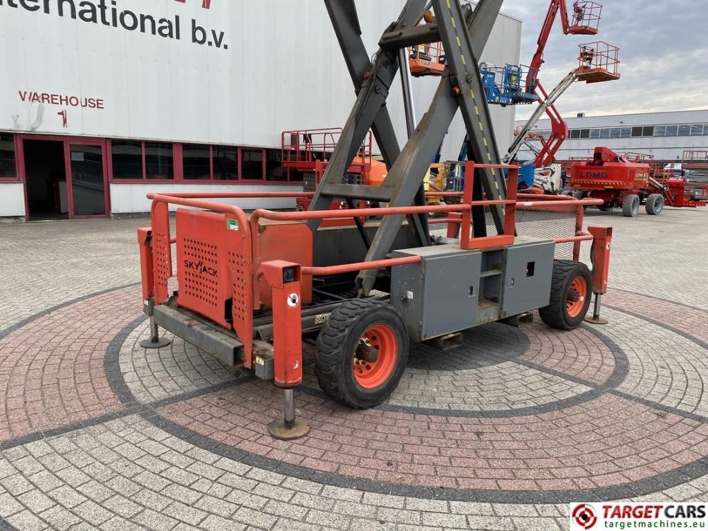 Škarasta podizna platforma SkyJack SJ9250 RT Diesel 4x4 Scissor Work Lift 1720cm: slika Škarasta podizna platforma SkyJack SJ9250 RT Diesel 4x4 Scissor Work Lift 1720cm Škarasta podizna platforma SkyJack SJ9250 RT Diesel 4x4 Scissor Work Lift 1720cm: slika Škarasta podizna platforma SkyJack SJ9250 RT Diesel 4x4 Scissor Work Lift 1720cm