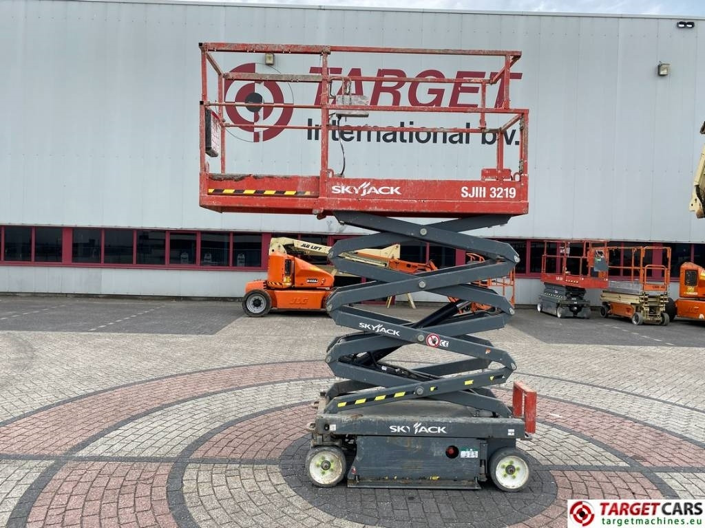 SkyJack SJIII-3219 Electric Scissor Work Lift 780cm - Škarasta podizna platforma: slika SkyJack SJIII-3219 Electric Scissor Work Lift 780cm - Škarasta podizna platforma SkyJack SJIII-3219 Electric Scissor Work Lift 780cm - Škarasta podizna platforma: slika SkyJack SJIII-3219 Electric Scissor Work Lift 780cm - Škarasta podizna platforma