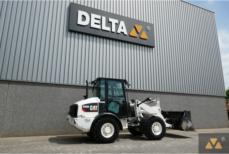 Caterpillar 906M - Utovarivač na kotačima: slika Caterpillar 906M - Utovarivač na kotačima Caterpillar 906M - Utovarivač na kotačima: slika Caterpillar 906M - Utovarivač na kotačima