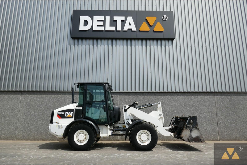 Caterpillar 906M - Utovarivač na kotačima: slika Caterpillar 906M - Utovarivač na kotačima Caterpillar 906M - Utovarivač na kotačima: slika Caterpillar 906M - Utovarivač na kotačima