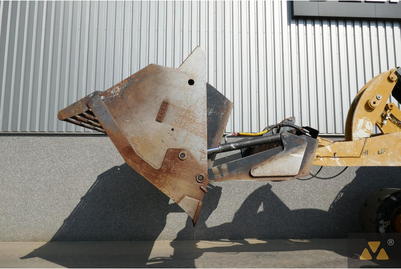 Utovarivač na kotačima Caterpillar 938M: slika Utovarivač na kotačima Caterpillar 938M Utovarivač na kotačima Caterpillar 938M: slika Utovarivač na kotačima Caterpillar 938M