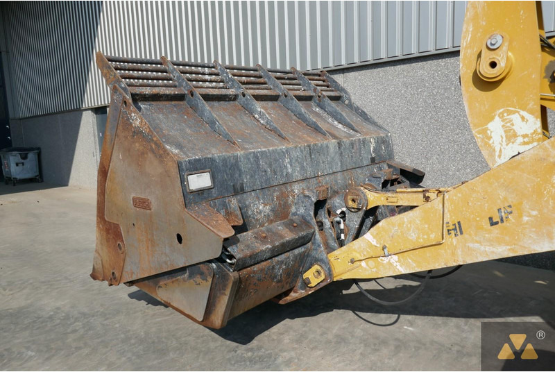 Utovarivač na kotačima Caterpillar 938M: slika Utovarivač na kotačima Caterpillar 938M Utovarivač na kotačima Caterpillar 938M: slika Utovarivač na kotačima Caterpillar 938M