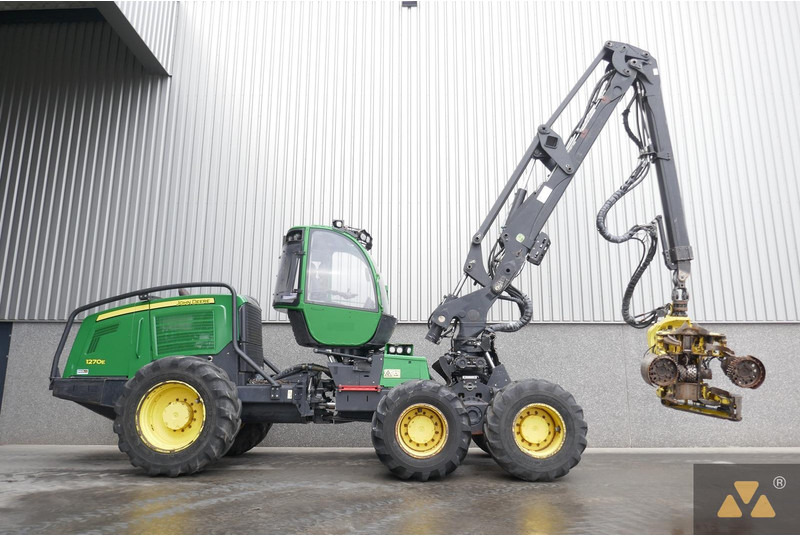 John Deere 1270E - Kombajn za šumarstvo: slika John Deere 1270E - Kombajn za šumarstvo John Deere 1270E - Kombajn za šumarstvo: slika John Deere 1270E - Kombajn za šumarstvo