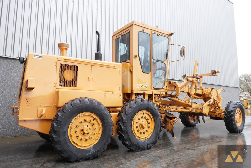 Mitsubishi MG300 - Grejder: slika Mitsubishi MG300 - Grejder Mitsubishi MG300 - Grejder: slika Mitsubishi MG300 - Grejder