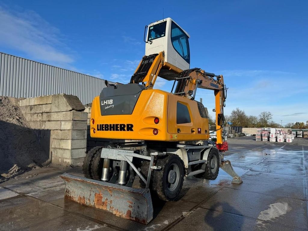 Liebherr LH 18 M - Stroj za rukovanje otpadom: slika Liebherr LH 18 M - Stroj za rukovanje otpadom Liebherr LH 18 M - Stroj za rukovanje otpadom: slika Liebherr LH 18 M - Stroj za rukovanje otpadom